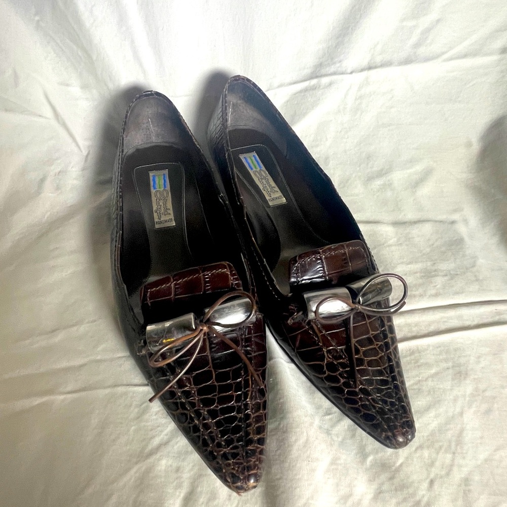Arnold Churgin croc-embossed leather flats with metal accents